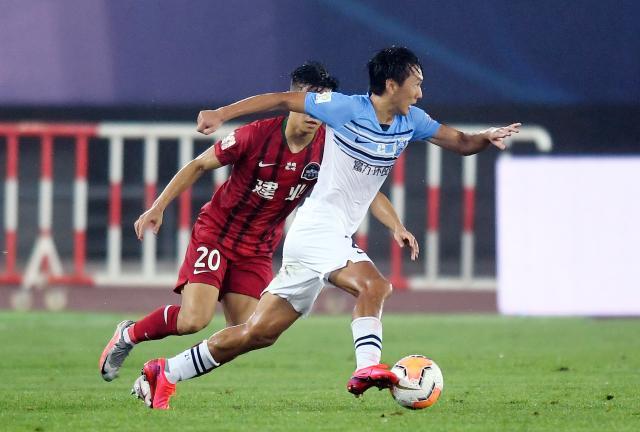 FB体育下载-国足增调常飞亚入队 韦世豪因伤暂无法正常训练